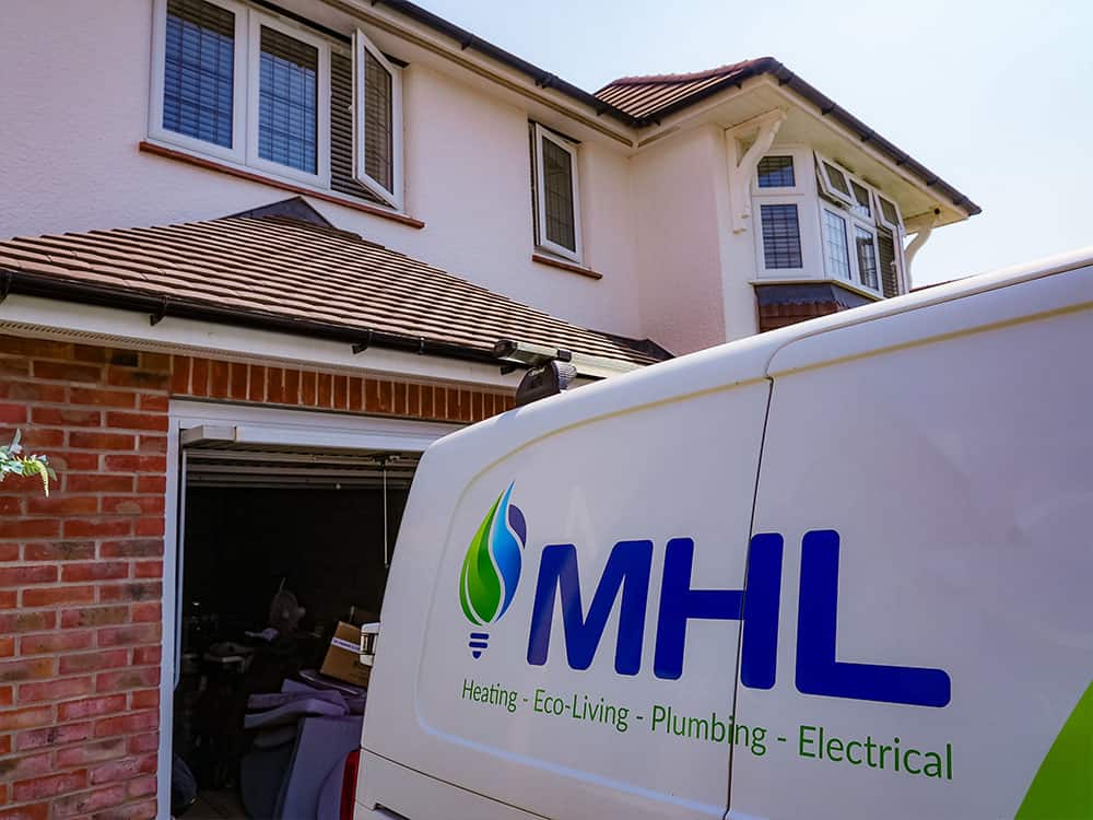 Trusted boiler repair service van outside residential property